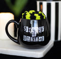 STRANGE & UNUSUAL MUG AND SOCKS SET